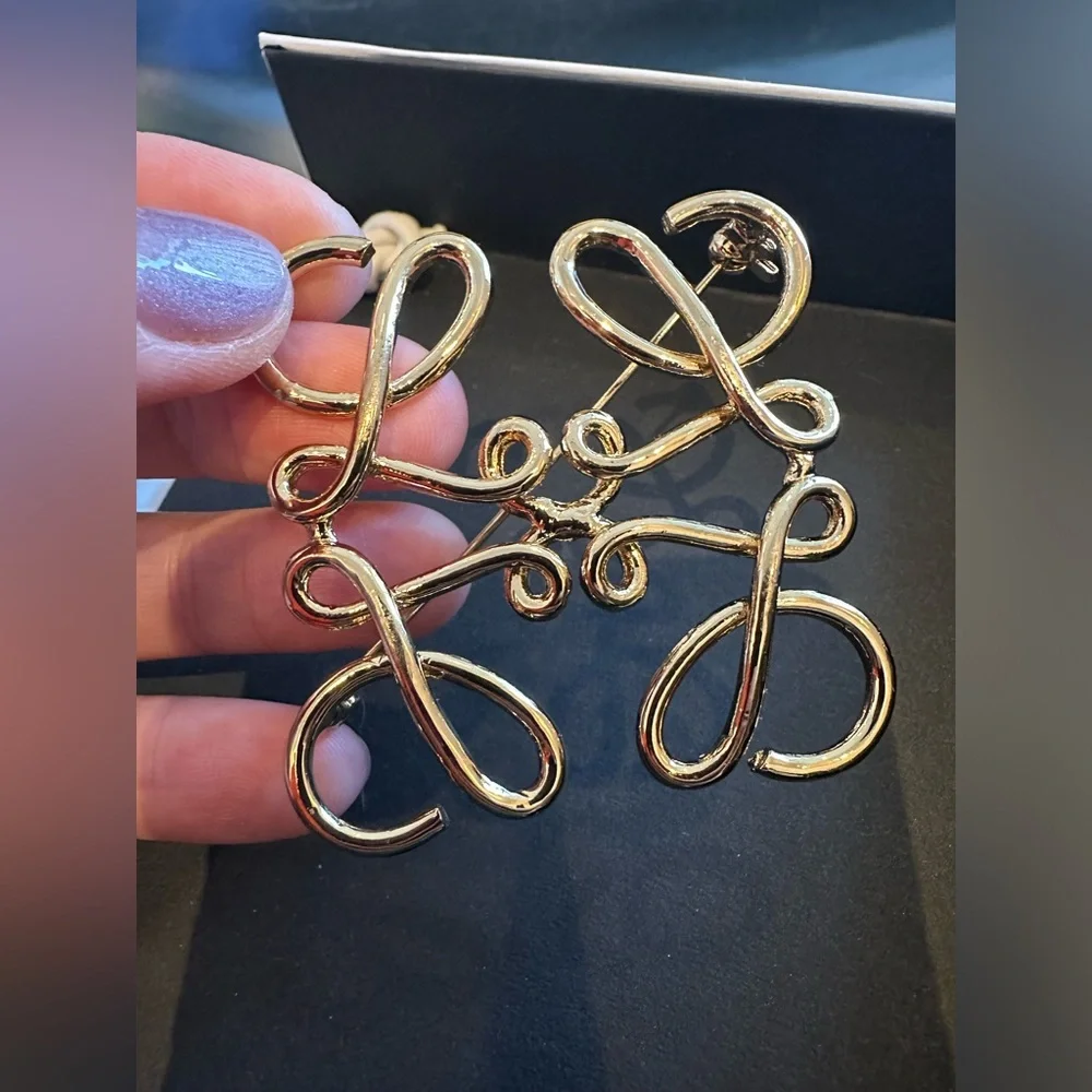 Loewe Gold Signature Anagram pin  Reposhed from a reputable posher . Never worn